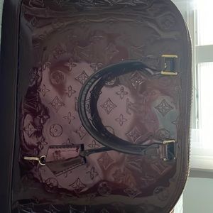 authentic louis in very good condition burgundy color.